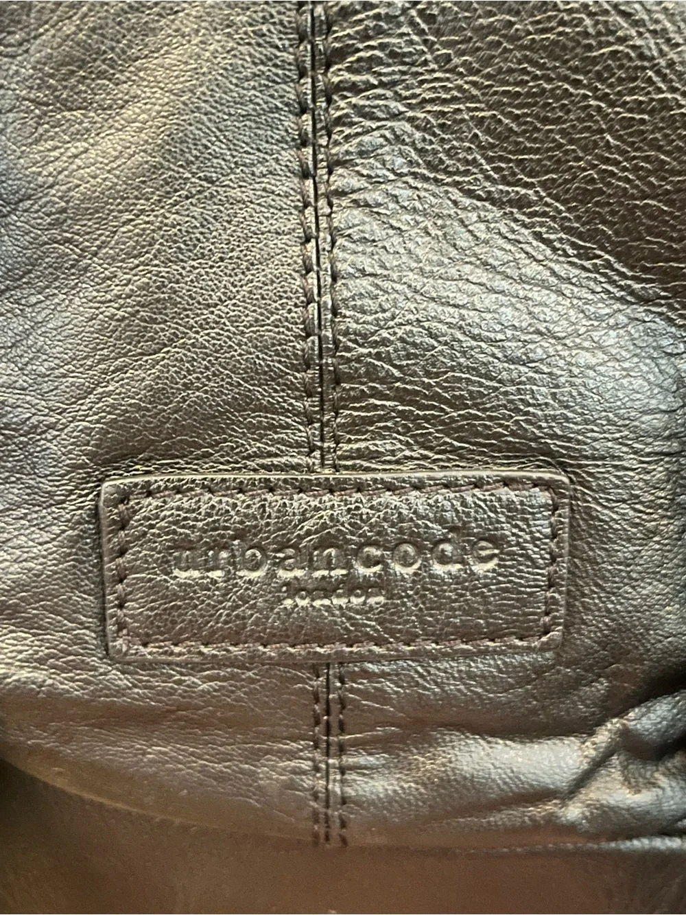 Sleek Black Leather Flap Backpack